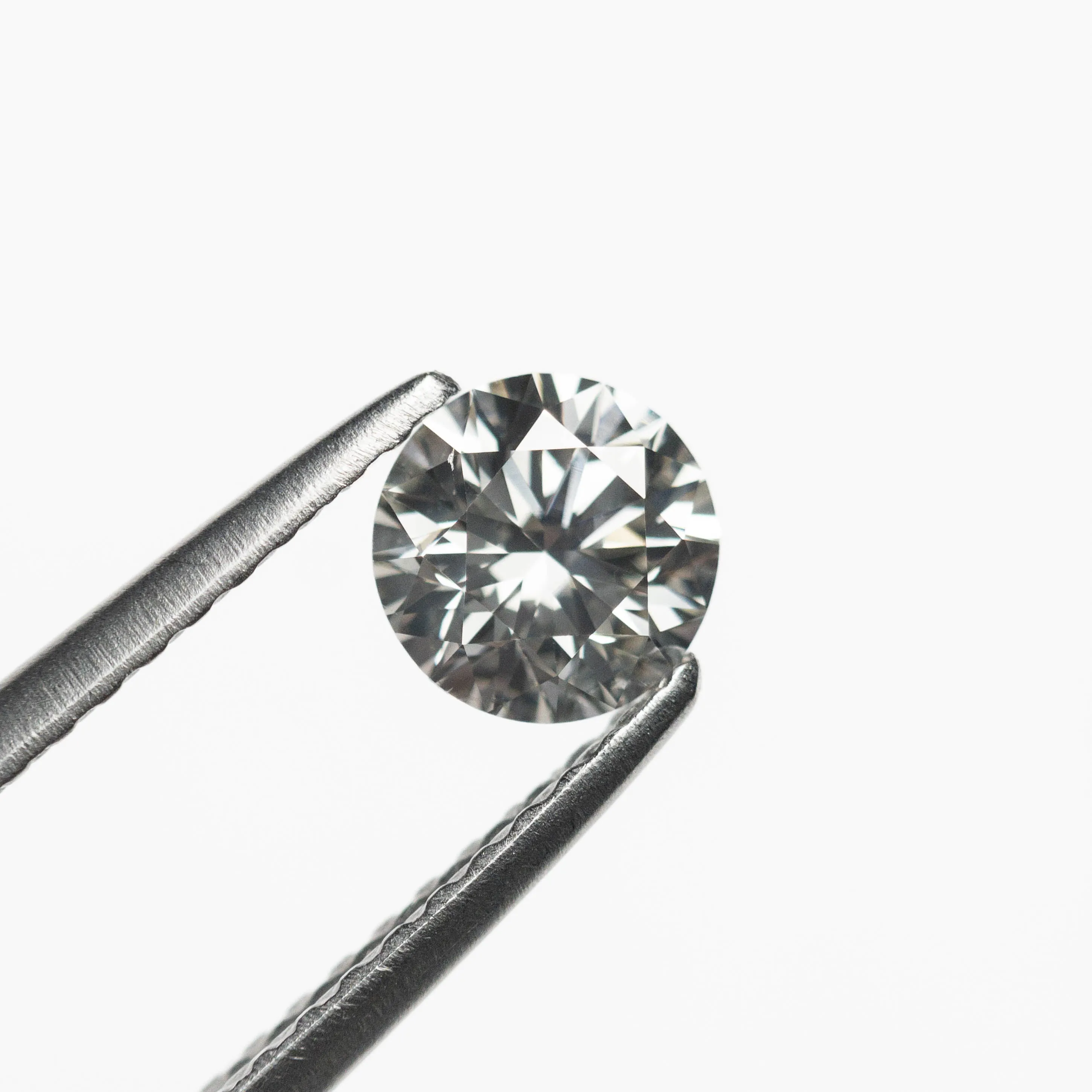 0.54ct 5.15x5.12x3.28mm Fancy Grey Round Brilliant 18968-14