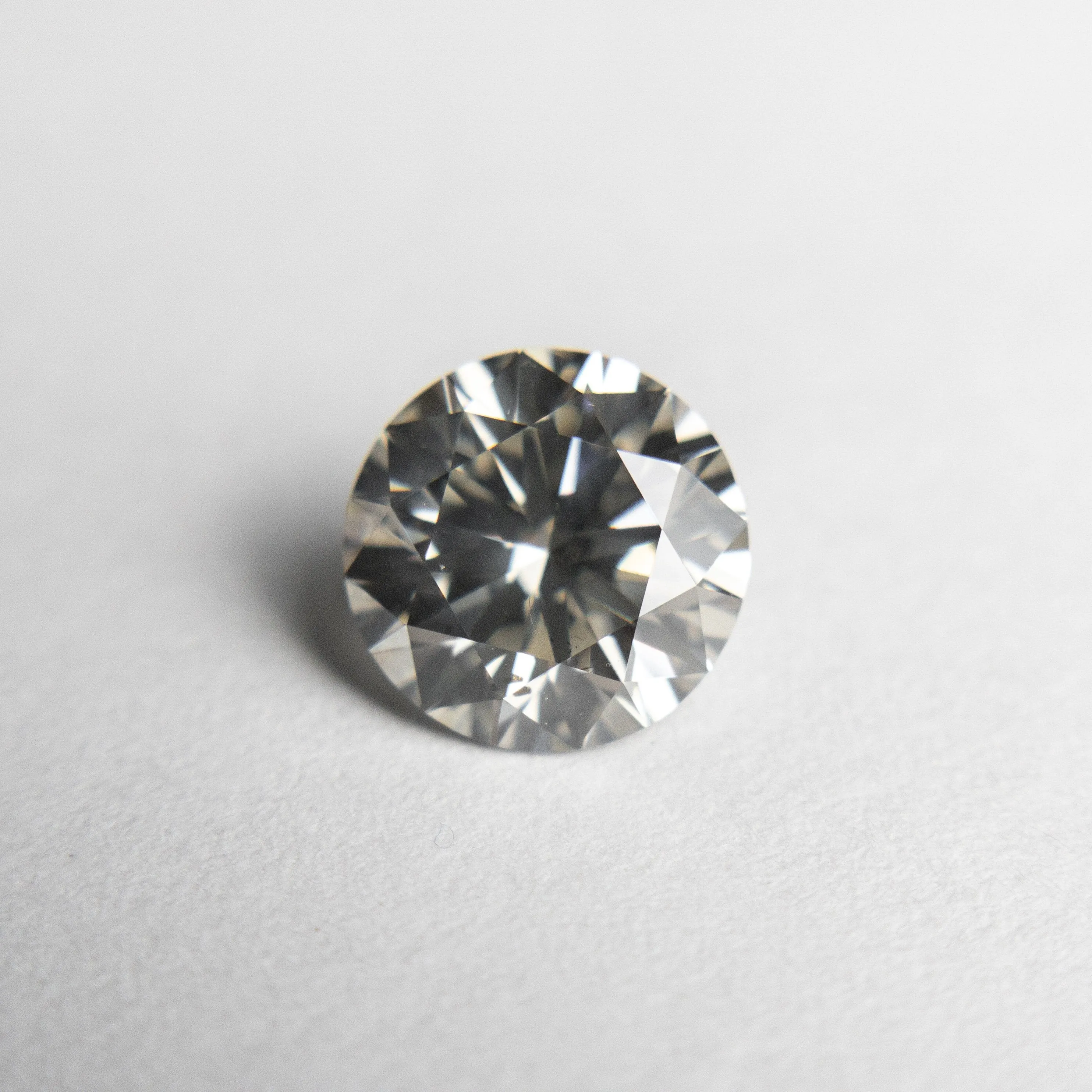 1.23ct 6.82x6.80x4.20mm Fancy Grey Round Brilliant 18475-01