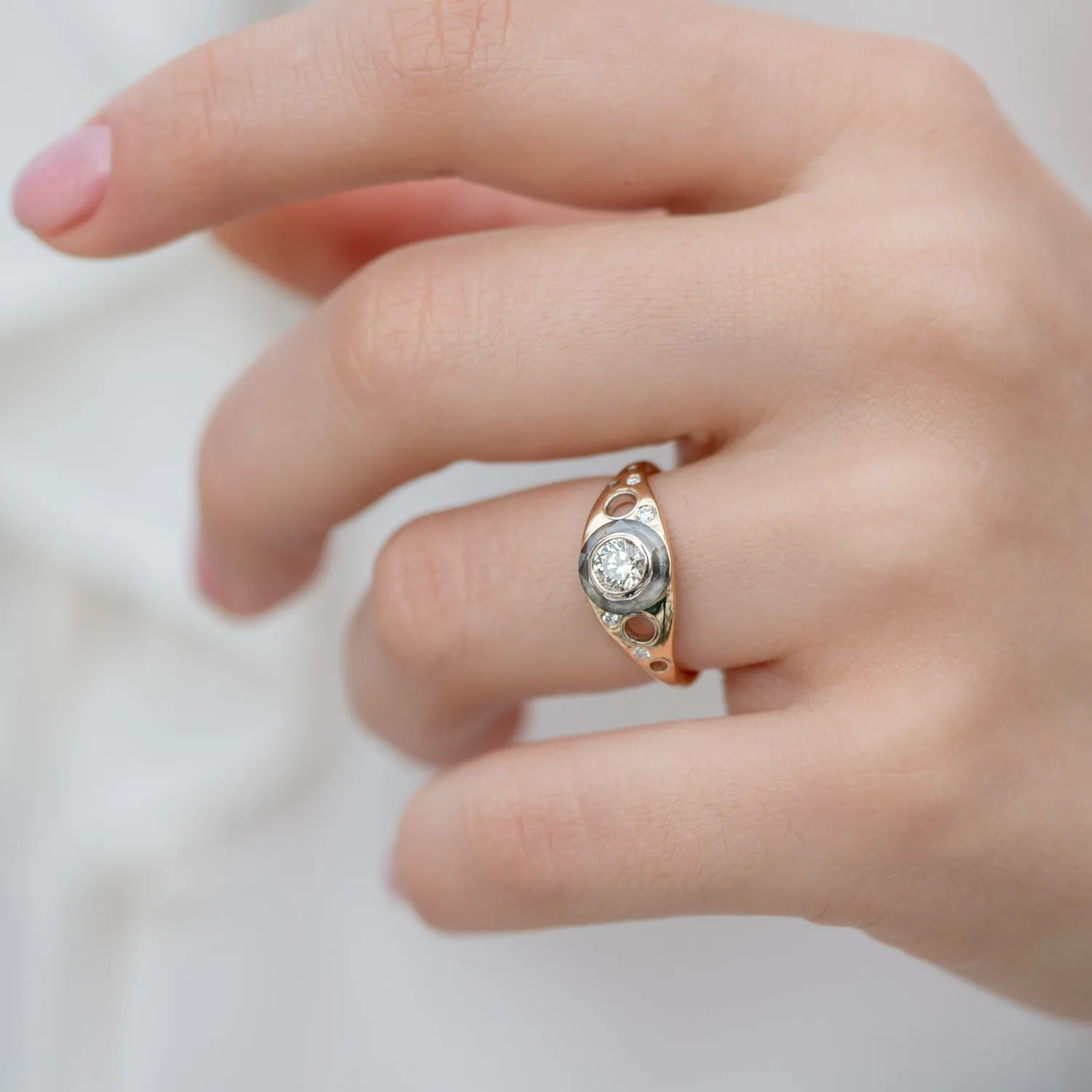 Golden Grommet Ring with a Fancy Green Diamond and Grey Diamond Sphere